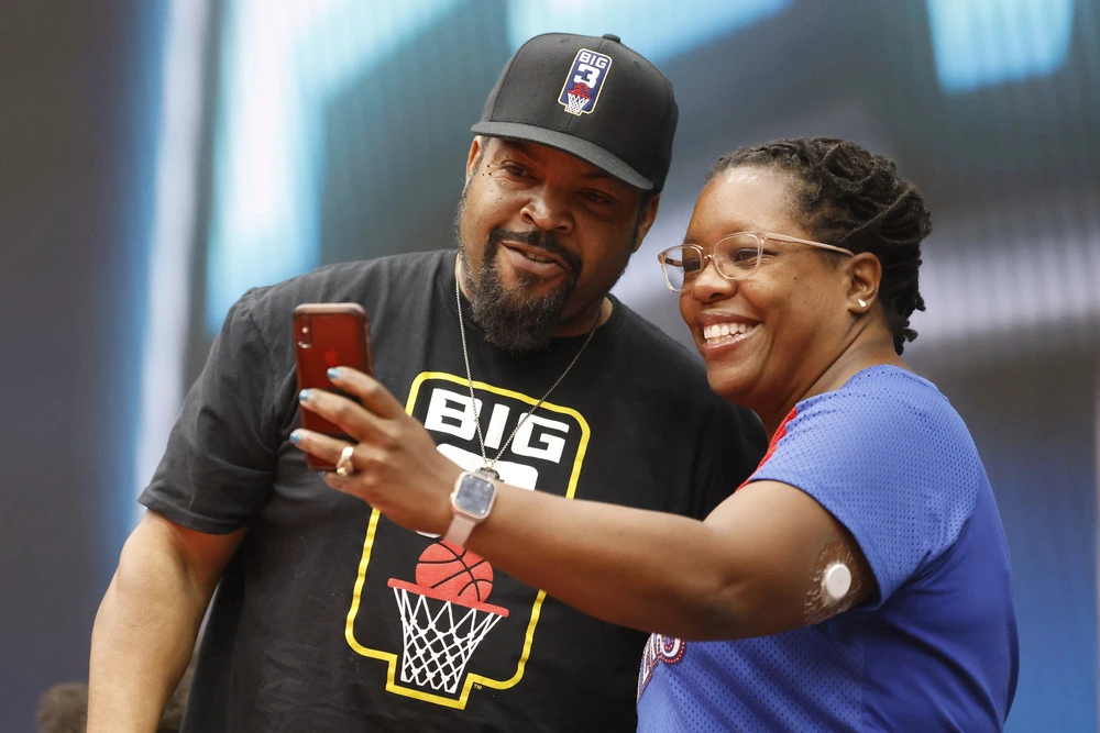 Ice Cube high-fives fans at a BIG3 game